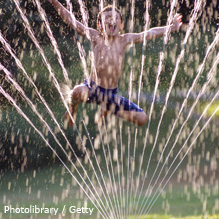 boy jumping in water