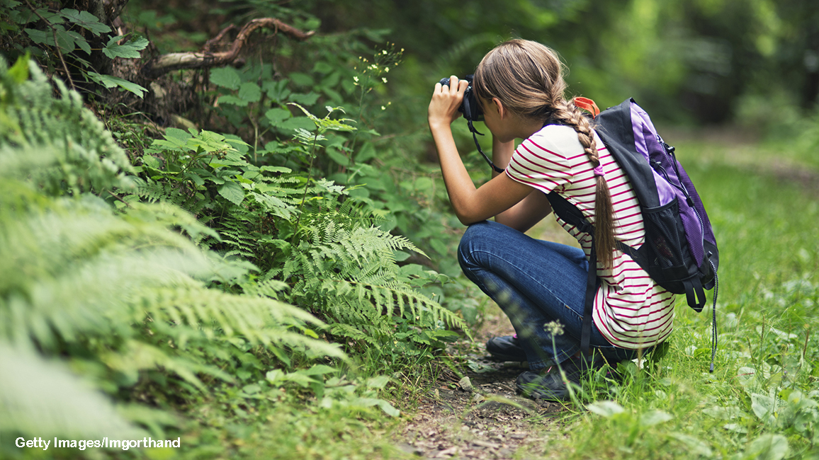 girl taking nature photos