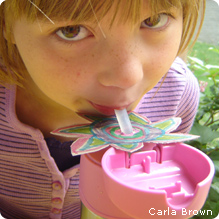 Girl with himmingbird sipper