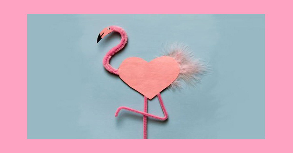 pink flamingos making a heart